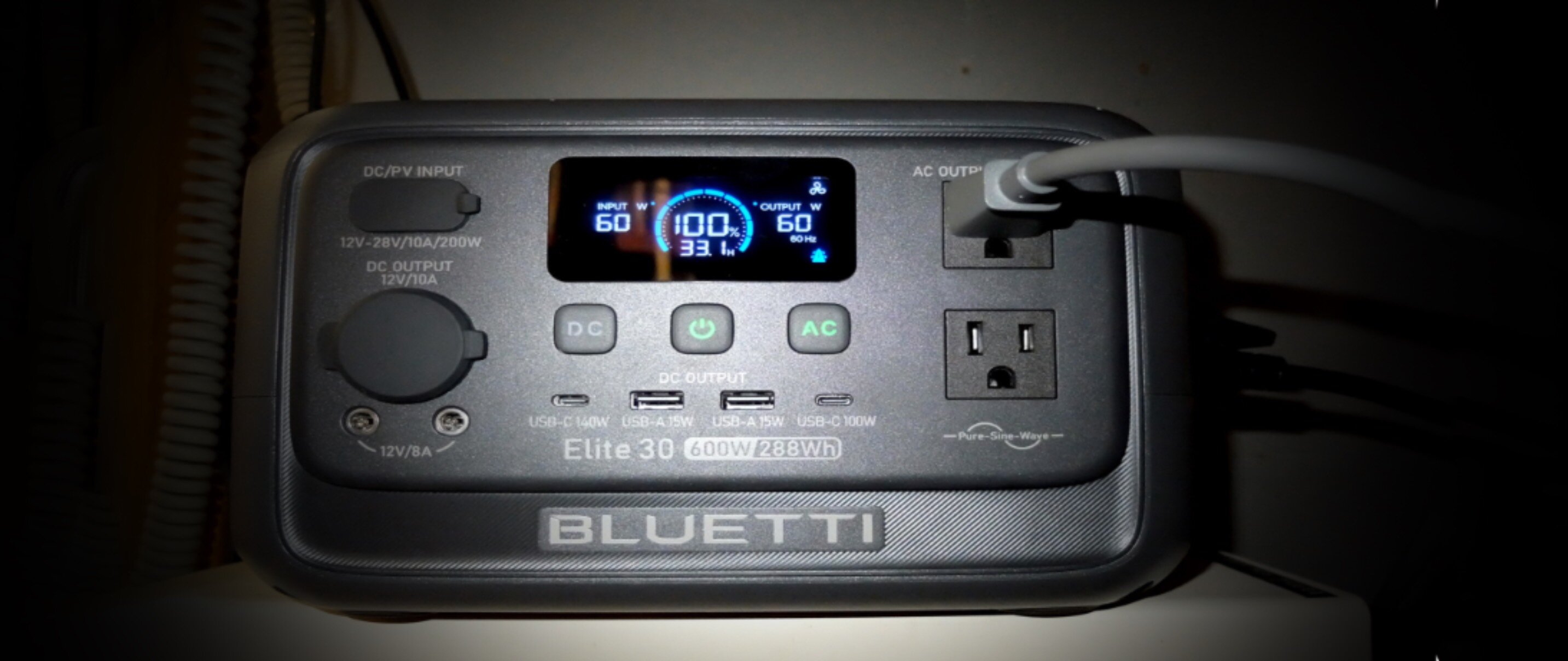 In its home, under the desk and atop the computer's uninterruptible power supply, the Bluetti battery box feeds clean electricity to the Starlink, and would continue to do so for four and a half hours even if the Bluetti were unplugged. (Credit: Dennis E. Powell)